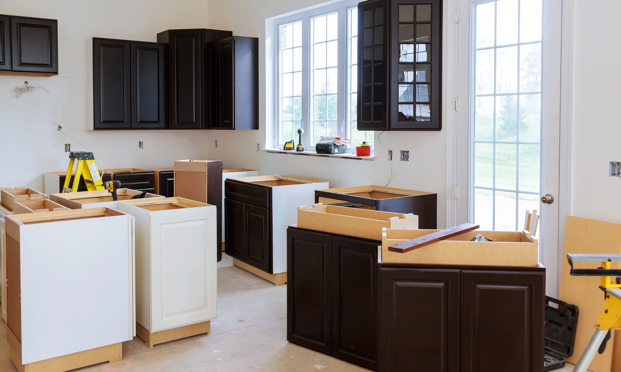 a kitchen is being remodeled with new cabinets.