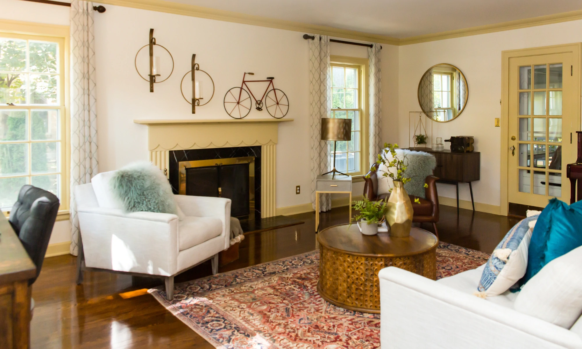 a living room filled with furniture and a fire place.