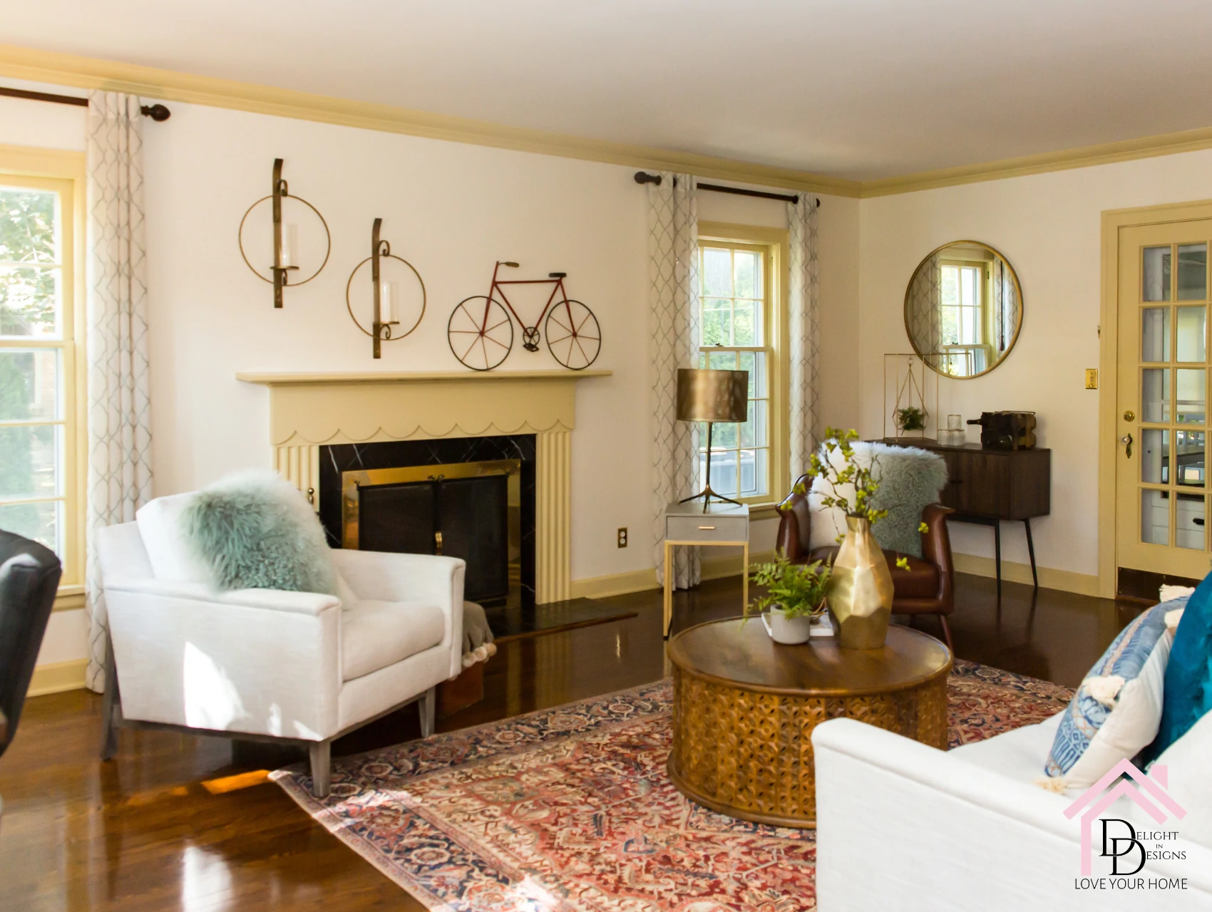 a living room filled with furniture and a fire place.