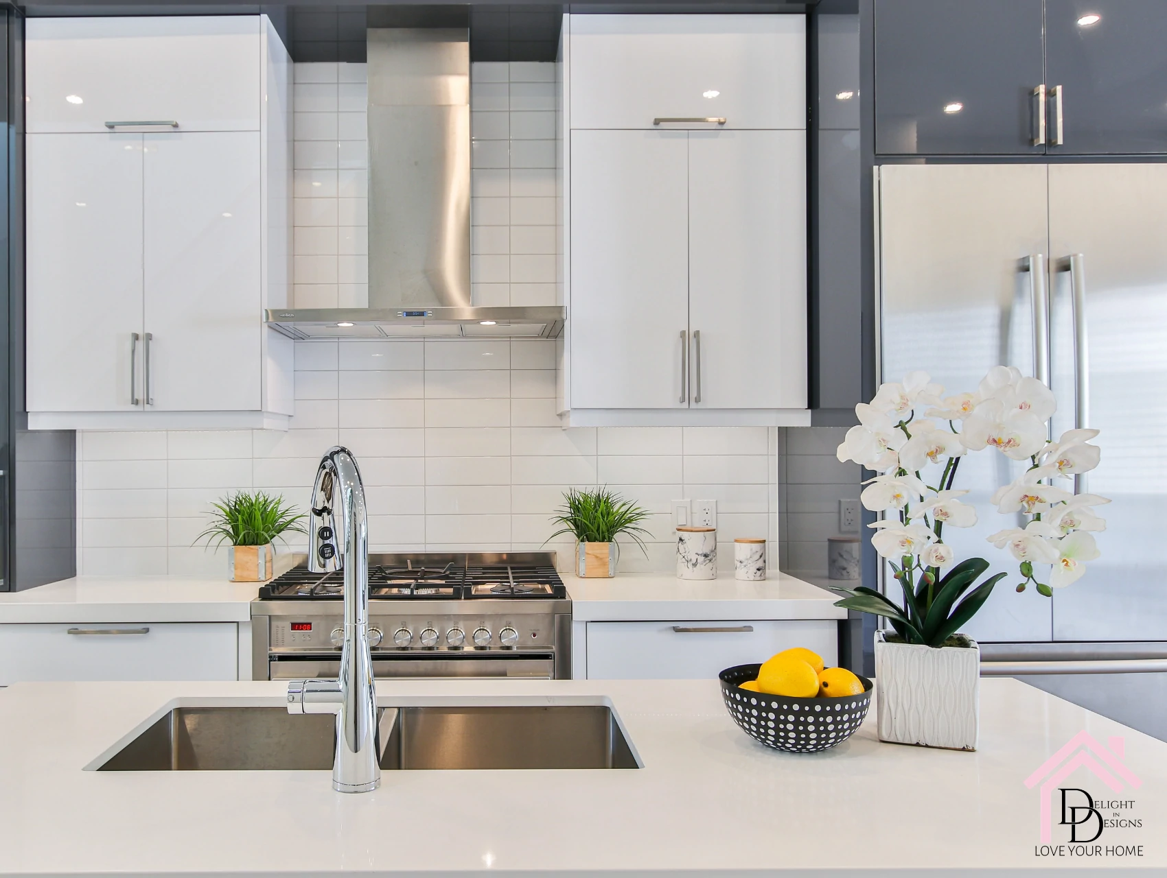 a kitchen with a sink and a stove.
