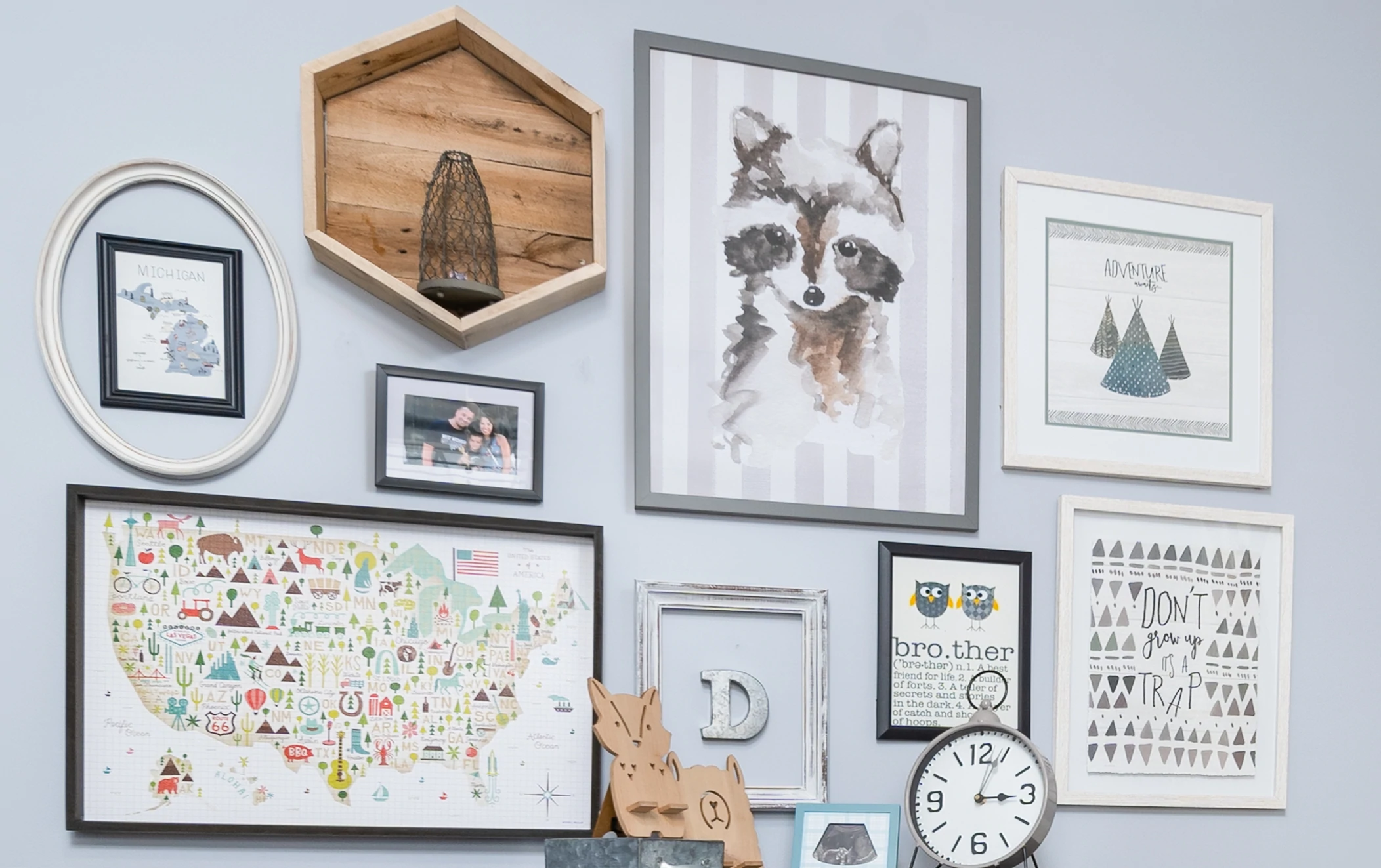 a wall with a bunch of pictures on it.