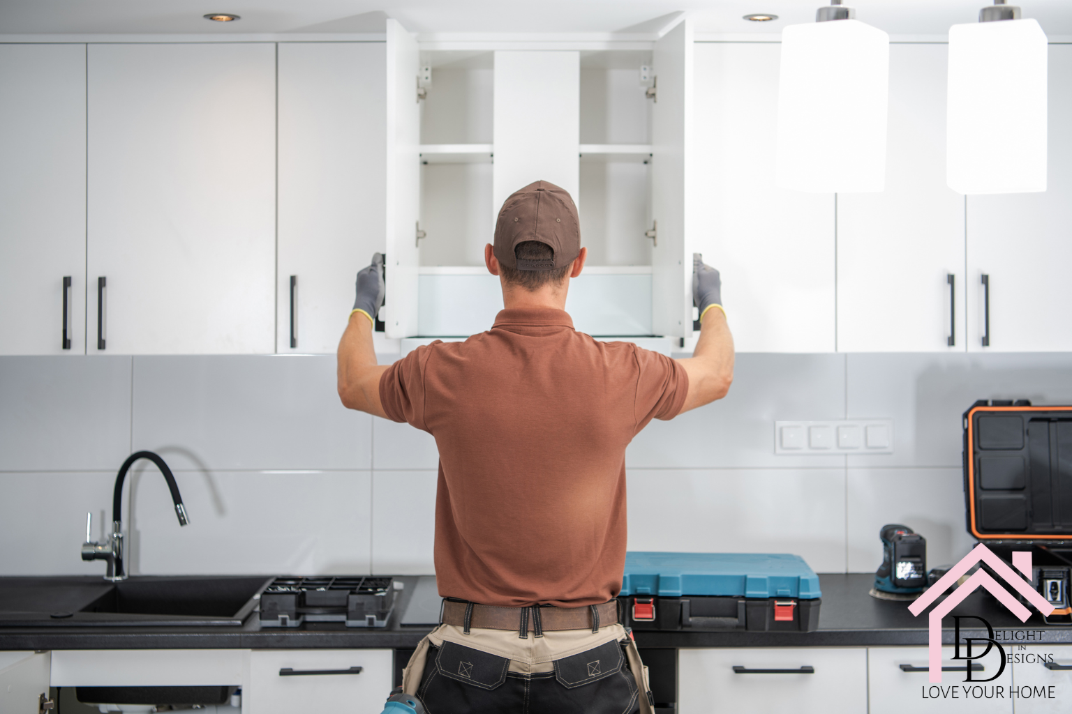 A man installing a cabinet remodeling blunders