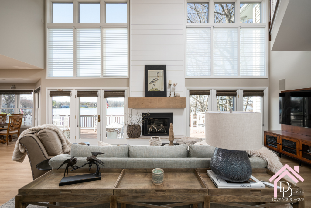 Grand living room with a white shiplap fireplace with a natural wood mantle New Year Resolutions